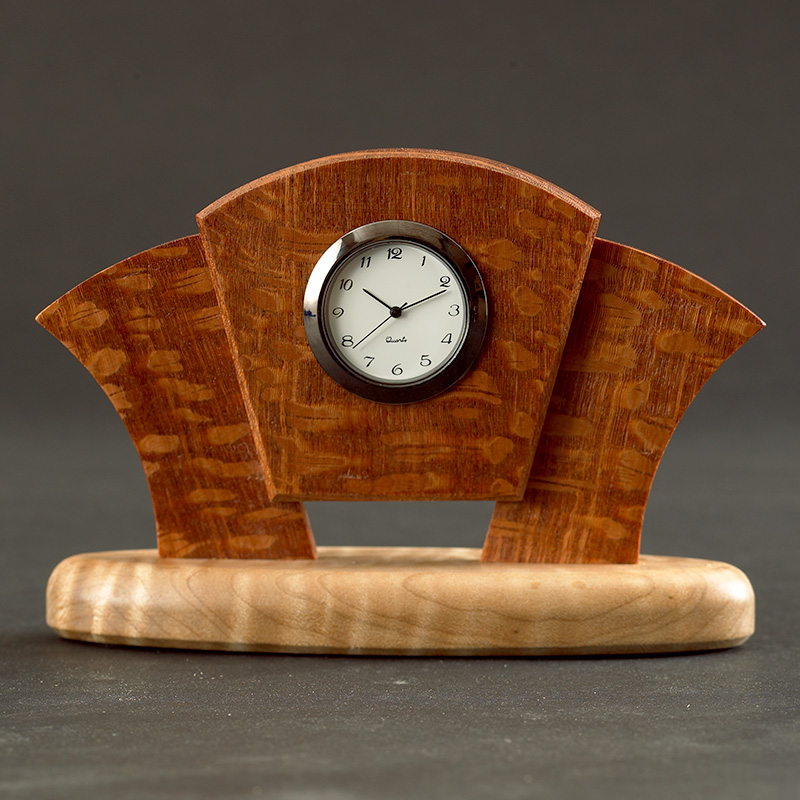 Wooden desk clock made from leopardwood and maple in an Art Deco style